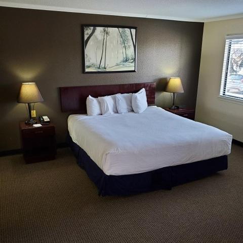 Sterling Hotel And Suites Clive Kültér fotó